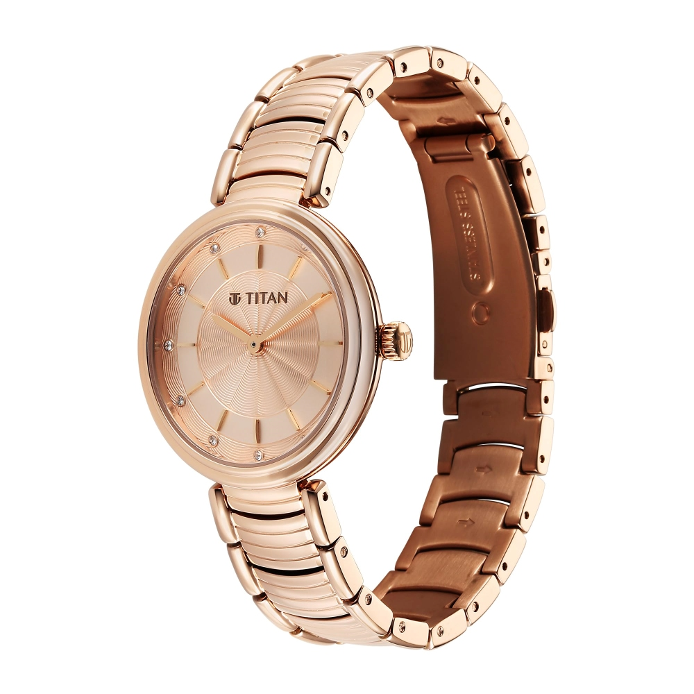 Titan Aura Quartz Analog Rose Gold Dial Rose Gold Stainless Steel Strap Watch for Women (95240WM01)
